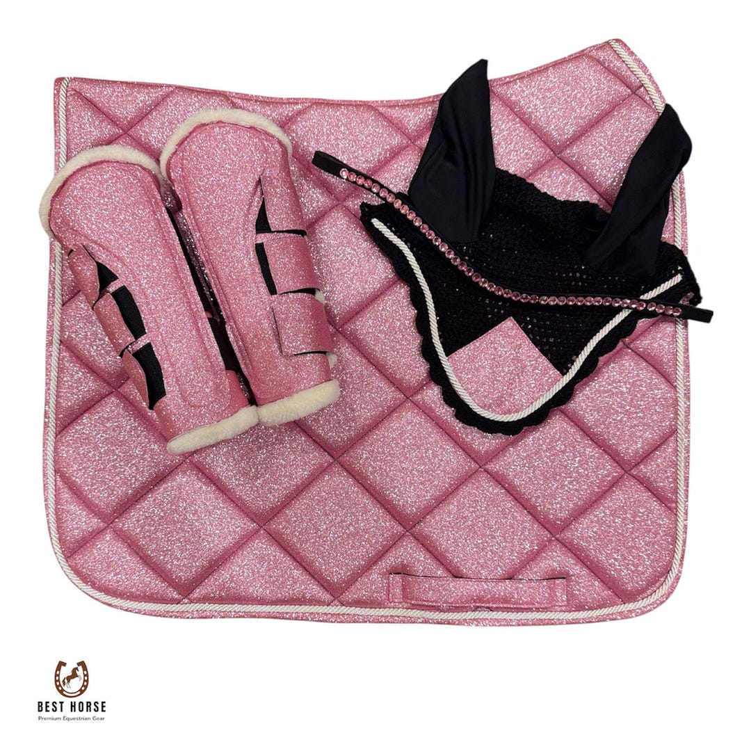 Pink glitter saddle pad set with matching brushing boots, black ear bonnet with pink crystals and browband by Best Horse