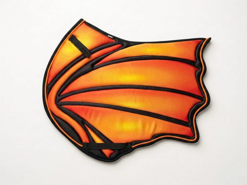 Fire dragon wing saddle pad with orange and yellow flame gradient and black piping by Best Horse