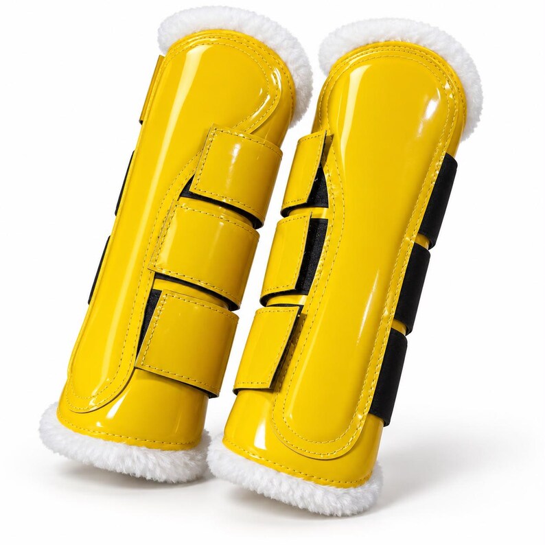 Yellow horse brushing boots with faux fur lining