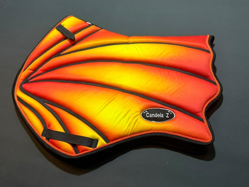 Flame print wing saddle pad with segmented panels and custom name badge